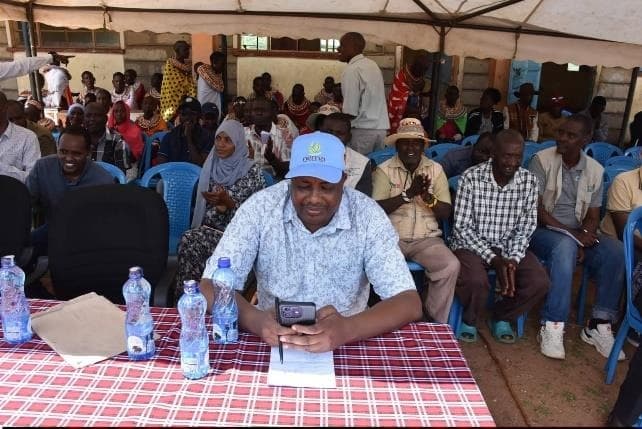 Community baraza (public meeting) convened by ASREP Africa in Isiolo, with elders and community members seated in a circle