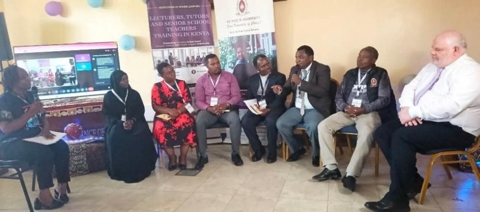 ASREP Africa Executive Director Dida Fayo on a panel at St Paul's University, Nairobi, discussing ASAL development