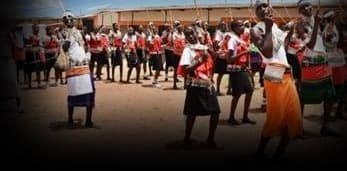 Samburu drummers and dancers performing at an ASREP Africa community cultural event in Isiolo County