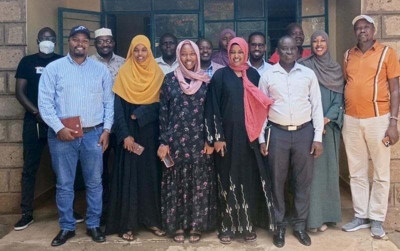 ASREP Africa team and community members gathered in the Isiolo landscape
